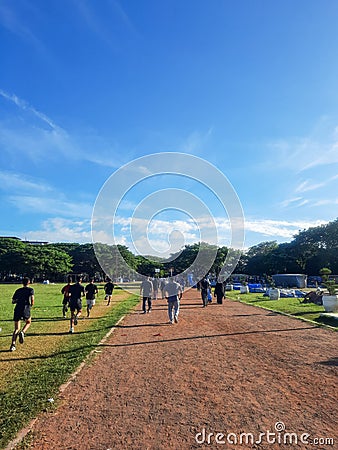 People jogging in the park. Morning walk Editorial Stock Photo
