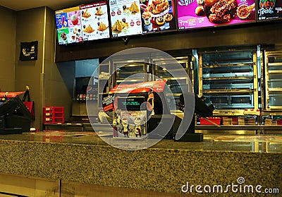 KFC Fast Food front counter at Dataran Pahlawan Mall in Bandar Hilir,Melaka. Editorial Stock Photo
