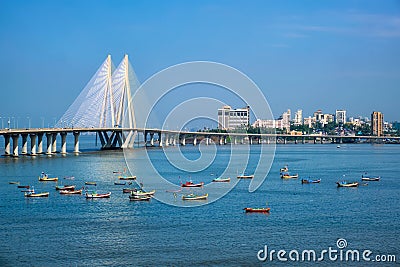 Bandra - Worli Sea Link bridge with fishing boats view from Bandra fort. Mumbai, India Stock Photo