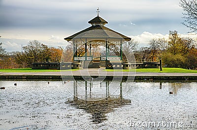 Bandstand and pond in Huddersfield, England Stock Photo