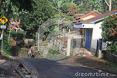 Very good concrete road between Bandung's tropical forests Editorial Stock Photo