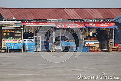 traders of various kinds of snacks, crackers and traditional drinks in the afternoon Editorial Stock Photo