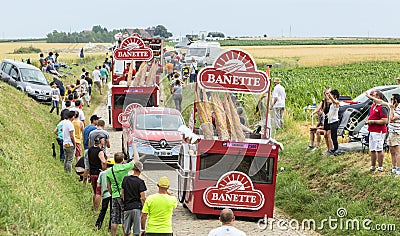 Banette Caravan on a Cobblestone Road- Tour de France 2015 Editorial Stock Photo
