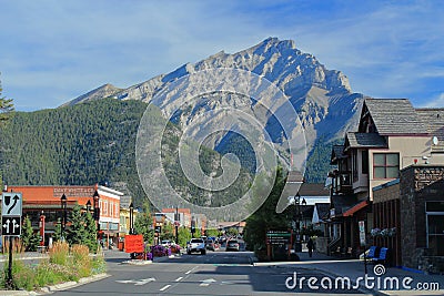 Banff National Park, Canadian Rocky Mountains, Banff Avenue and Mountain Scenery in Early Morning Light, Alberta, Canada Editorial Stock Photo