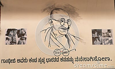 Bangalore India - June 3, 2019: Painting of Mahatma Gandhi at Indian railway station with images of Indian freedom struggle and Editorial Stock Photo