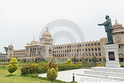 Bangalore, India - June 2, 2019 : Statue of Dr. B.R. Bhimrao Ambedkar holding Indian constitution Pointing towards Parliament of Stock Photo