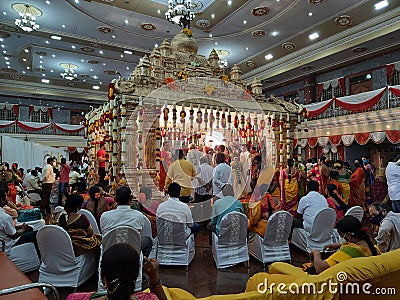 Closeup of beautifully decorated Big Golden Color Wedding Mandapa or Mantapa Design inside the Hindu Marriage Hall Editorial Stock Photo