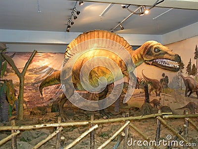 Bangalore, Karnataka, India - September 8, 2009 Orange color statue of Spinosaurus dinosaur Editorial Stock Photo