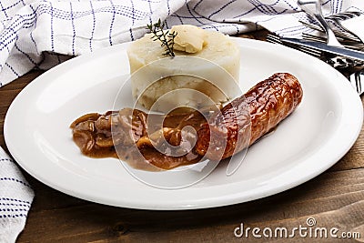 Banger and mash with some irish butter on a plate Stock Photo