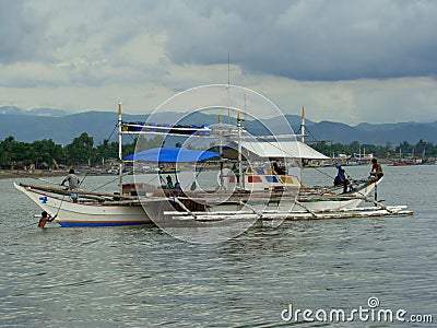 Bangkas, a traditional type of outrigger boats used by Filipino artisanal fishermen Editorial Stock Photo