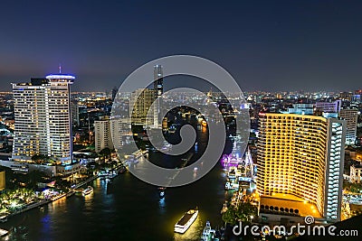 The Chao Phraya River and the night lights are very beautiful. Editorial Stock Photo