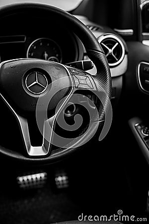 BANGKOK - Jan 22, 2022 : Close-up view of a cruise control on a black steering wheel for a BENZ B180. Editorial Stock Photo
