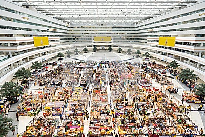 Bangkok: the main hall of Chaeng Watthana Government Complex occupied by a food and clothing market Editorial Stock Photo