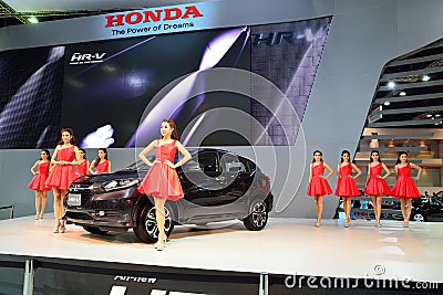 BANGKOK - March 26 : Unidentified young woman, Honda Lady, prese Editorial Stock Photo