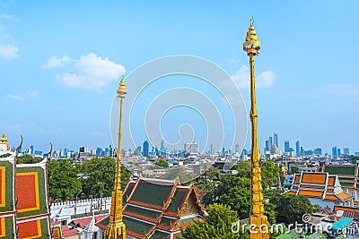 Bangkok skyline: golden spires of Lokha Prasat and downtown Stock Photo