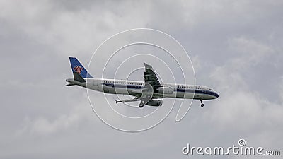 Passenger airplane flying in the sky Editorial Stock Photo