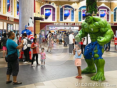 Bangkok, Thailand - Apr 24, 2019: Unidentified Man taking a photo of his child with the Hulk model during Avengers 4 Endgame Editorial Stock Photo