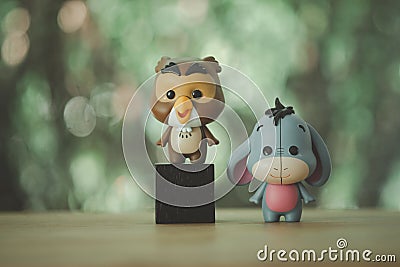 Bangkok, Thailand - April 12, 2021 : Cute figurine of Eeyore and Owl, Winnie the pooh Figures Mystery box Blind box from Miniso Editorial Stock Photo