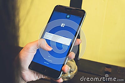 BANGKOK ,THAILAND - April 24, 2017 : Login Screen Facebook icons on Apple IPhone. largest and most popular social networking site Editorial Stock Photo