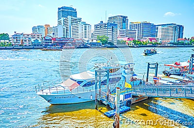 The small yacht at the pier of Chao Phraya river in Bangkok, Thailand Editorial Stock Photo