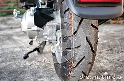 BANGKOK, THAILAND - APRIL 03, 2019: New Tubeless Performance Touring Tire fitted on a 2019 Honda Scoopy i Club 12 Motor Scooter. Editorial Stock Photo