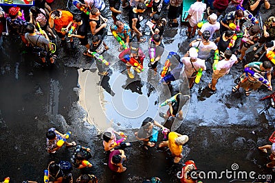 Songkran Festival crowded with Thai people and tourists on Silom Road, Bangkok, Thailand Editorial Stock Photo