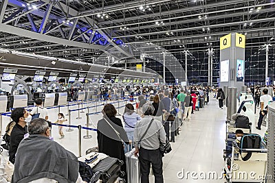 Bangkok, Thailand - April 10, 2023: Suvarnabhumi Airport with many travelers during the Songkran Festival because it is the Thai Editorial Stock Photo