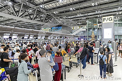 Bangkok, Thailand - April 10, 2023: Suvarnabhumi Airport with many travelers during the Songkran Festival because it is the Thai Editorial Stock Photo