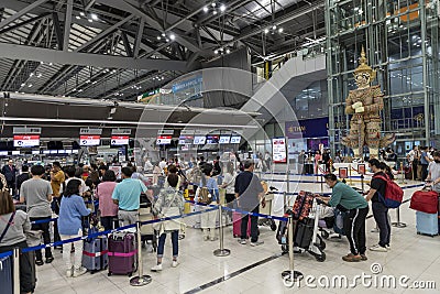 Bangkok, Thailand - April 10, 2023: Suvarnabhumi Airport with many travelers during the Songkran Festival because it is the Thai Editorial Stock Photo