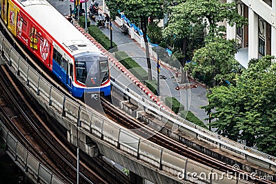 Bangkok, Thailand - 26 Aug 2021, Bangkok Mass Transit System BTS in close up view is driven in the sky railroad from Ratchadamri Editorial Stock Photo