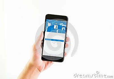 Bangkok, Thailand - August 23, 2017 : Login Screen Facebook icons on Apple IPhone. largest and most popular social networking site Editorial Stock Photo