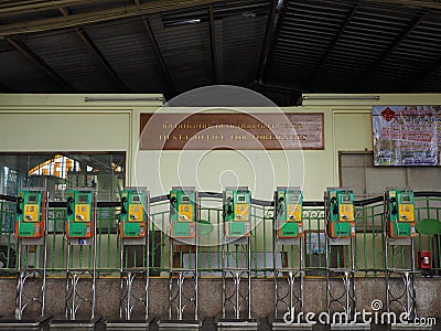 Public payphones at Bangkok main train station Editorial Stock Photo