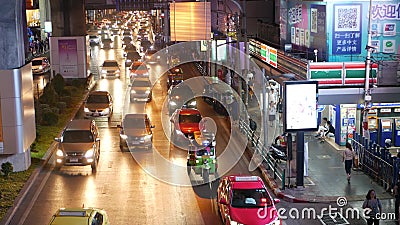 BANGKOK, THAILAND - 18 DECEMBER, 2018: Cars in a traffic jam on the road of the overpopulated asian city of Thai capital at night Editorial Stock Photo