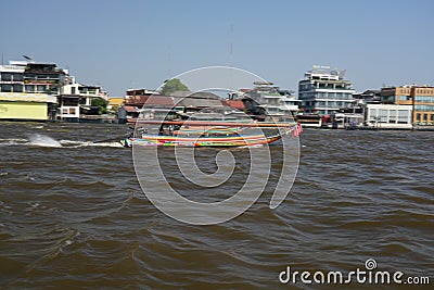 Panning of a ferry boat crusing on Chao Phraya river Editorial Stock Photo