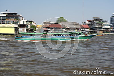 Panning of a ferry boat crusing on Chao Phraya river Editorial Stock Photo