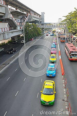 BANGKOK, THAILAND - DECEMBER 29 2012 : taxi drivers wait for passenger on the street in queue line Editorial Stock Photo