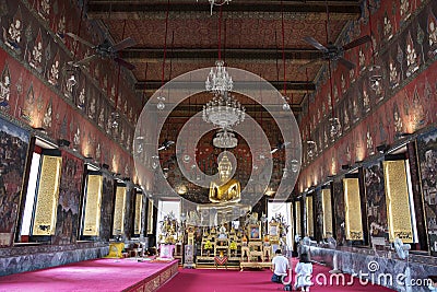 Golden Buddha statue in the Phra Ubosot of Wat Saket Editorial Stock Photo