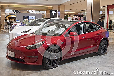Tesla electric cars display on the showroom in the shopping mall, Bangkok Editorial Stock Photo