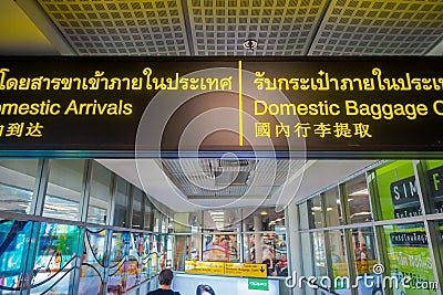 BANGKOK, THAILAND - FEBRUARY 01, 2018: Close up of informative sign domestic baggage and domestic arrivals inside of Editorial Stock Photo