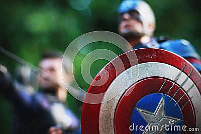 Close up shot of Captain America Civil War and Hawkeye superheros figure in action fighting Editorial Stock Photo