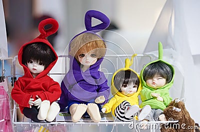 Bangkok, Thailand - Jan 27, 2019 : A photo of cute plush ball jointed doll BJD doll wearing colorful teletubbies sweater. Editorial Stock Photo