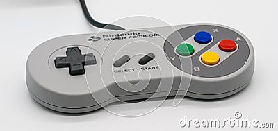 Super Famicom Mini Controller, Vintage game console by Nintendo. Editorial Stock Photo