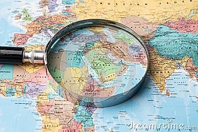 Bangkok, Thailand - January 20, 2022 Asia, Magnifying glass close up with colorful world map, travel, geography, tourism and Editorial Stock Photo