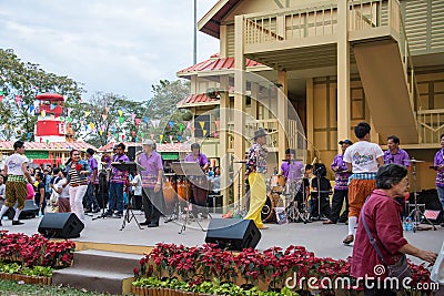 BANGKOK, THAILAND - JANUARY 16: thai tradition folk song musicians performing on stage in Lumpini park , Bangkok in Thailand on th Editorial Stock Photo