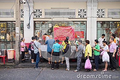 Unidentified people standing to buy street food on Chinatown Editorial Stock Photo