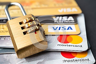 Bangkok, Thailand - July 1, 2020 Golden security digital password lock key on visa master card. Editorial Stock Photo