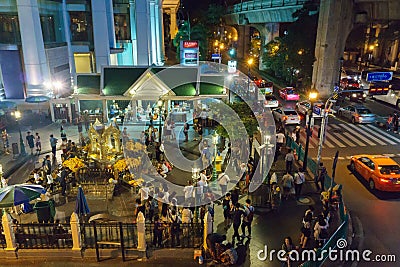 Bangkok, Thailand- july 17,J2014:the Erawan Shrine at Ratchaprasong Intersection at night time Editorial Stock Photo