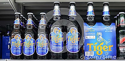 Tiger Beer on store shelf in supermarket. It launched in 1932, Tiger beer became Singapore`s Editorial Stock Photo