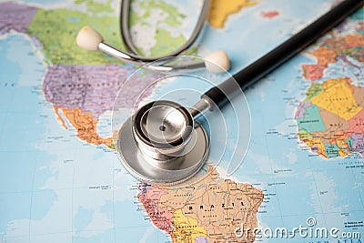 Stethoscope on USA America and Brazil world globe map background Editorial Stock Photo