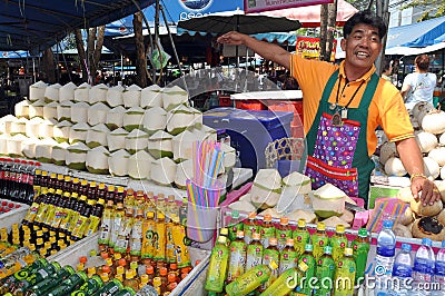 Bangkok, Thailand: Man Selling Coconut Drinks Editorial Stock Photo